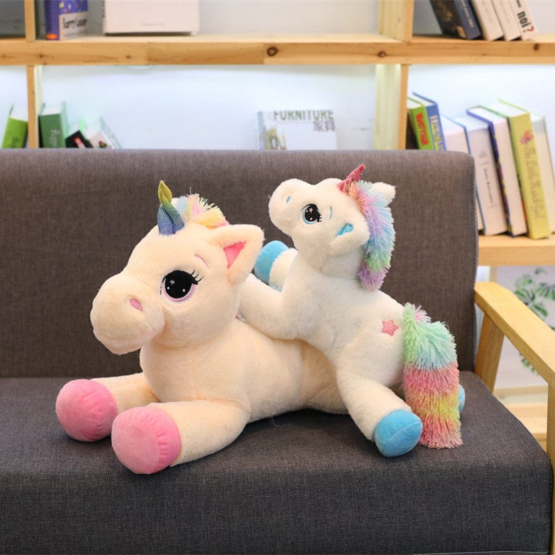 Peluche licorne avec des étoiles dans les yeux